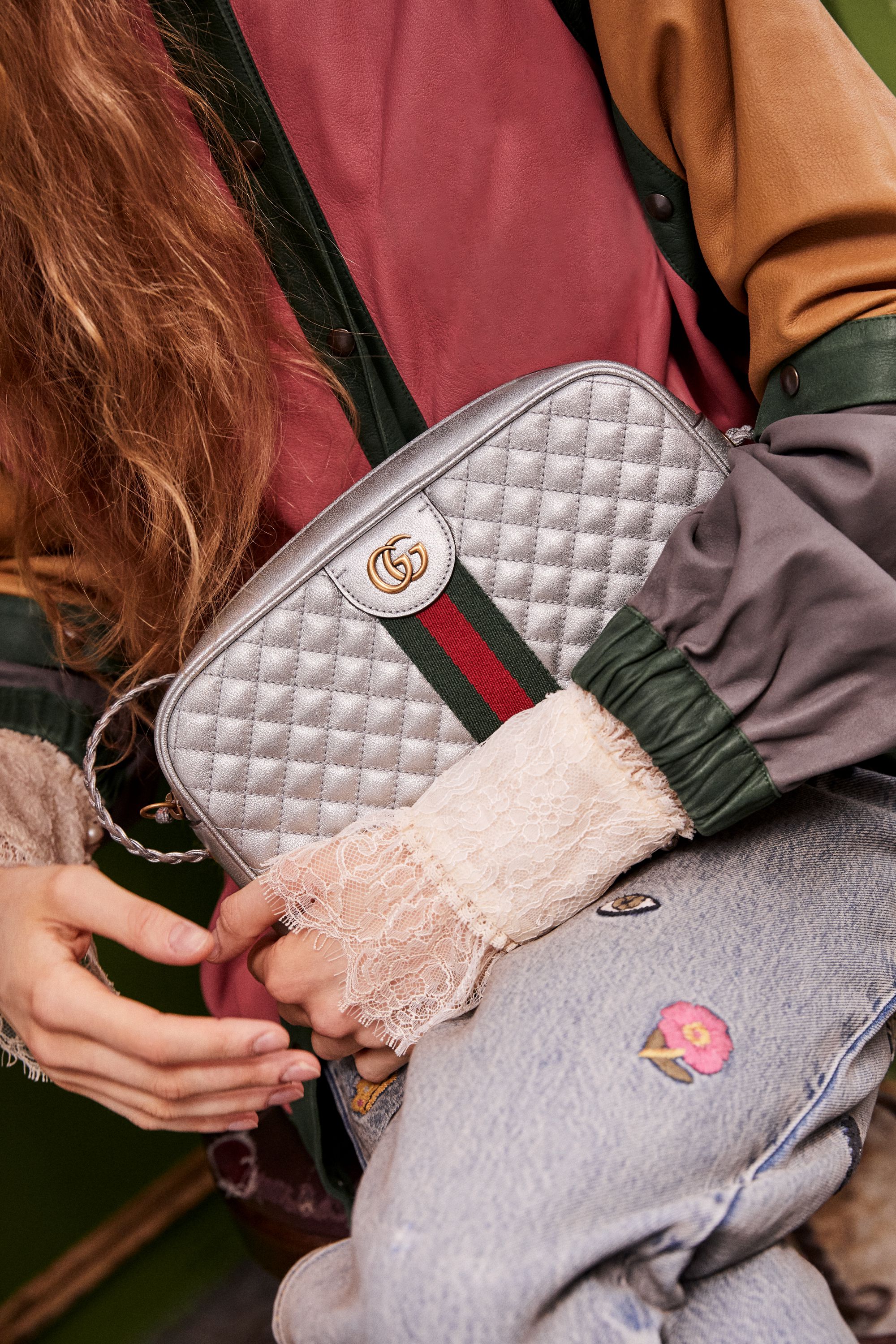 Gucci bag A model holding a Gucci bag