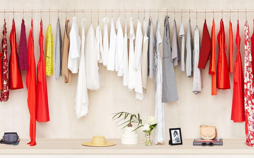 Rent the Runway Clothes hanging inside a closet