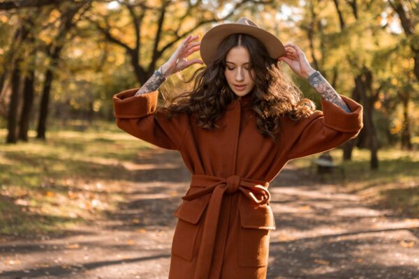 attractive-stylish-smiling-skinny-woman-with-curly-hair-walking-park-dressed-warm-brown-coat-autumn-trendy-fashion-street-style_285396-6812(1)