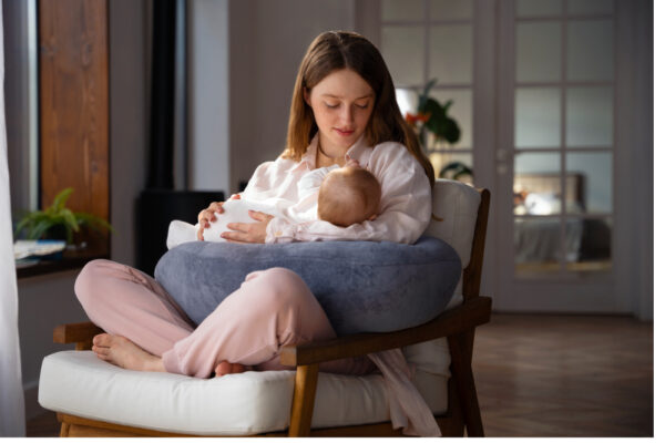 woman-using-nursing-pillow-home-newborn-baby(1)